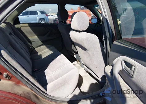 1999 Toyota Camry Le из США, поврежденный, VIN 4T1BG22K0XU557794